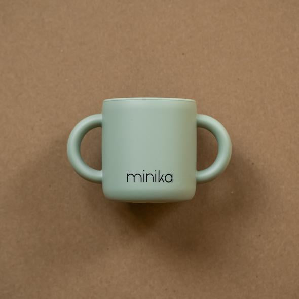 Tasse d'apprentissage avec poignées