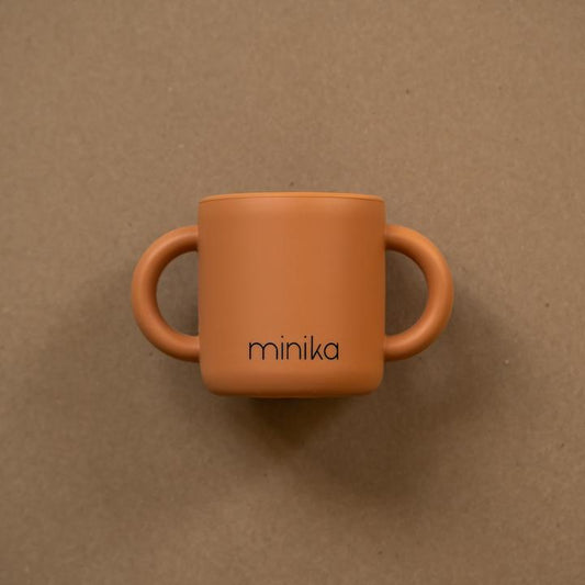 Tasse d'apprentissage avec poignées