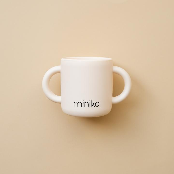 Tasse d'apprentissage avec poignées