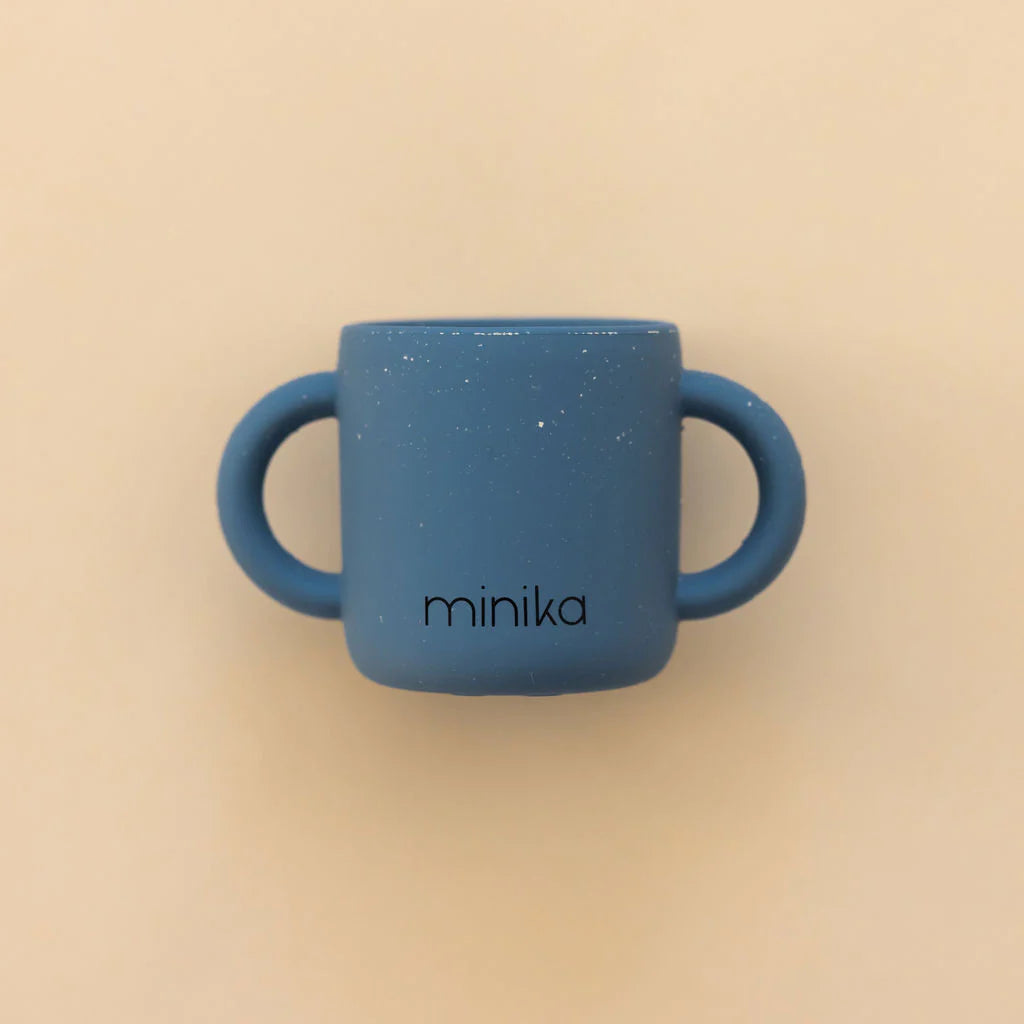Tasse d'apprentissage avec poignées