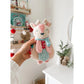 Renne rose des fêtes Itzy Lovey™ peluche + jouet de dentition