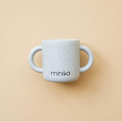 Tasse d'apprentissage avec poignées
